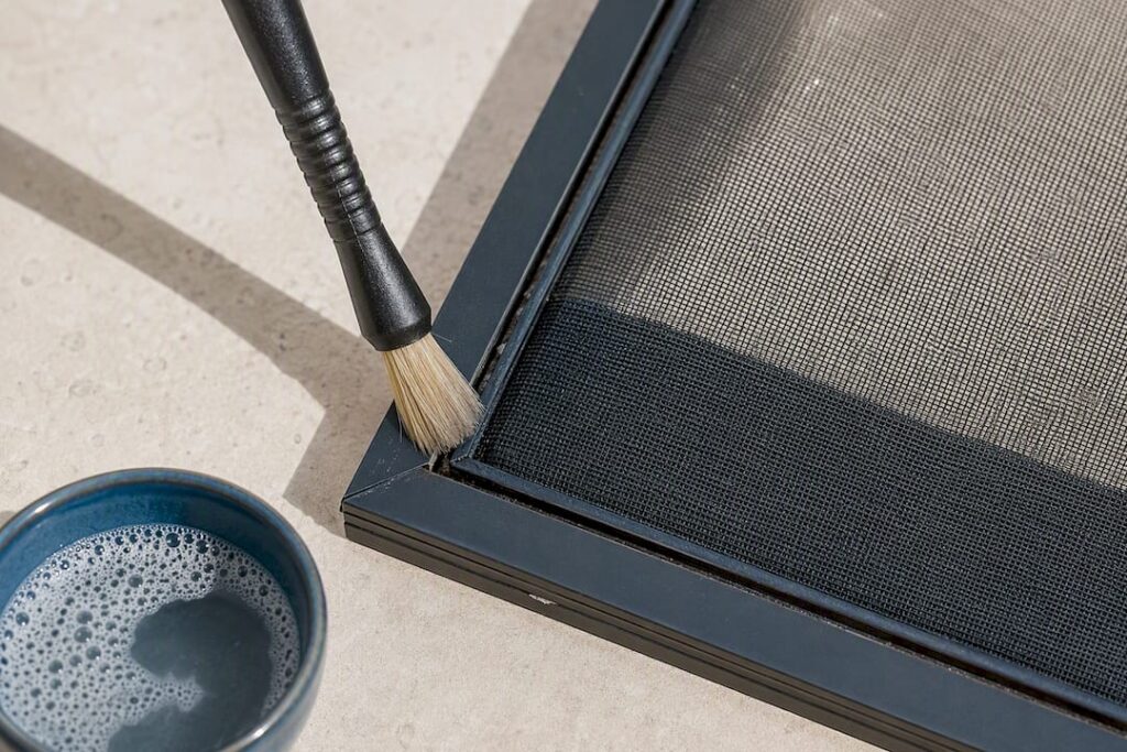 Soft brush cleaning pool screen corner seam